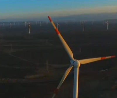 新疆借風(fēng)取暖 省錢環(huán)保實現(xiàn)零排放-中國新聞網(wǎng)